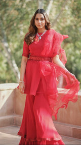 SUMMIYYA IN RED PEPLUM TOP AND DOUBLE SHARARA SET