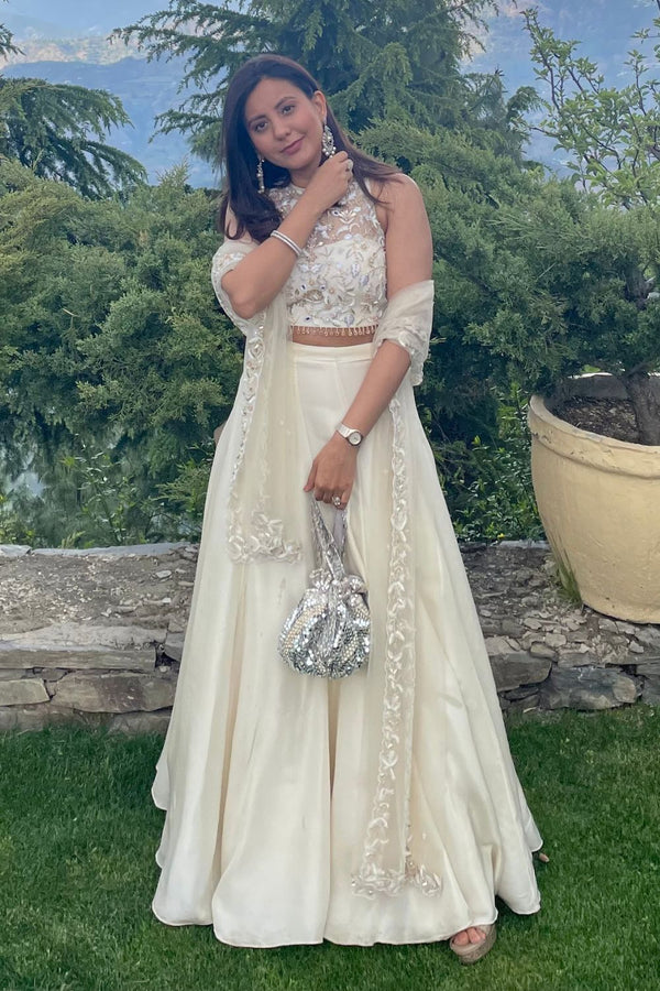 GARIMA IN CUSTOM IVORY TONAL BLOUSE AND PLEATED LEHENGA SET