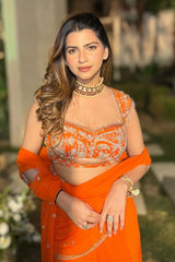 Dhriti Mehra In Our Orange Pre-Draped Saree