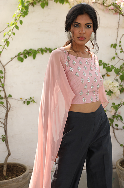 Pale pink crop top with flared sleeves and grey palazzo set
