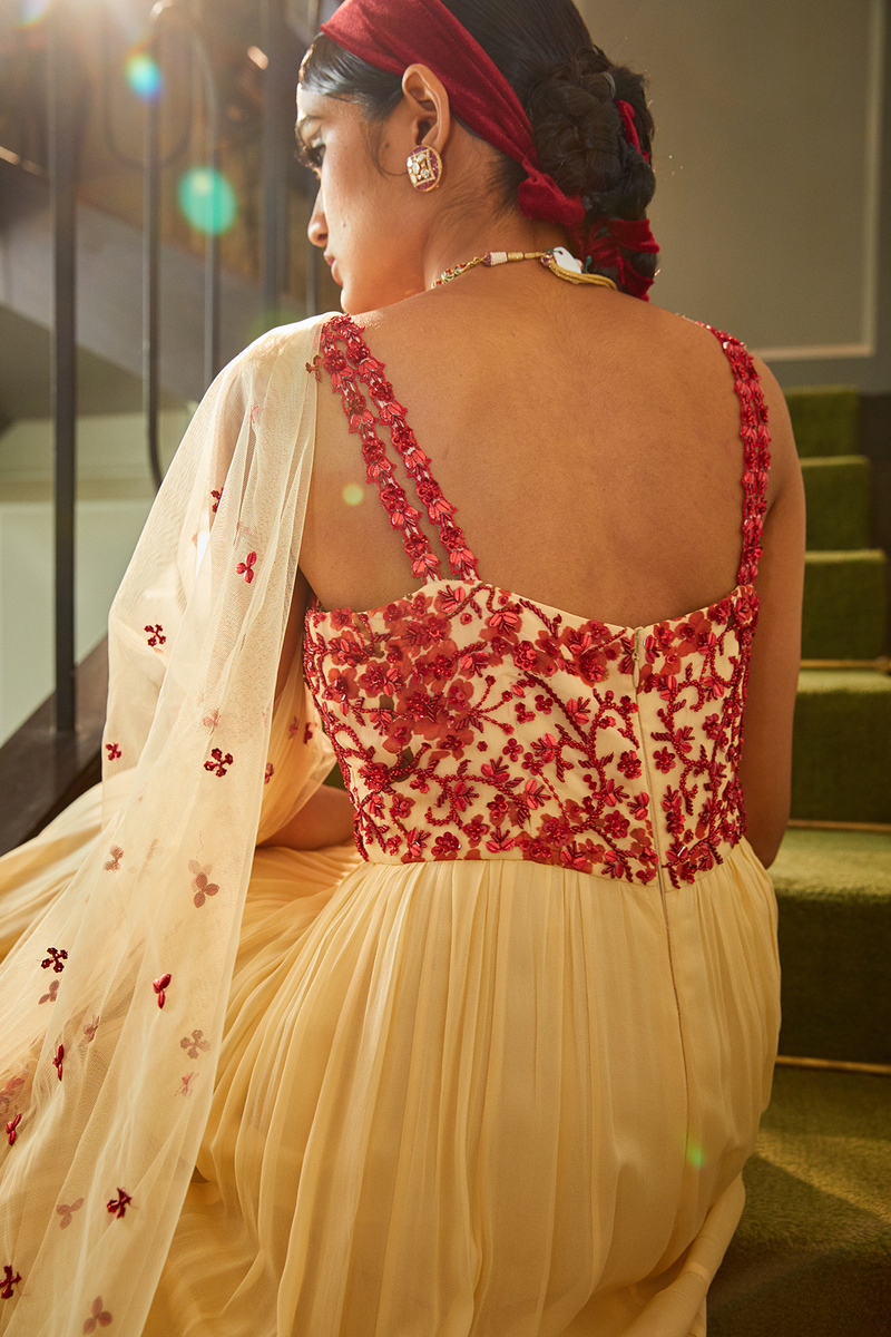 Ivory and red cherry blossom printed bustier yoke gown